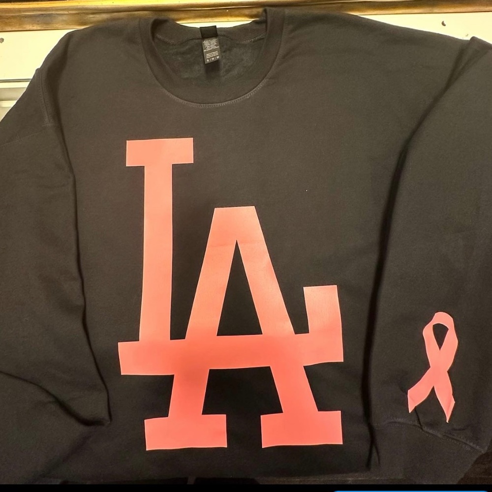 LA pink and black sweater